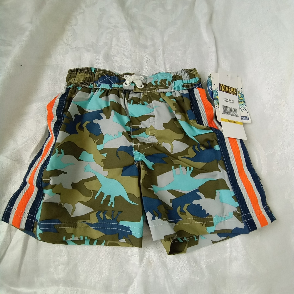 Infant's Dinosaur camo swim trunks. 12 months